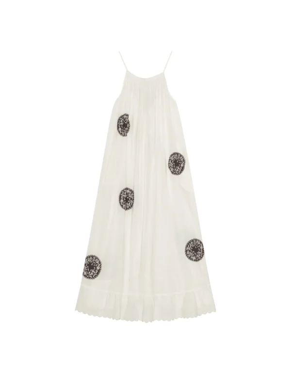 Pattie Strap Dress Maxi - Vannilla fra HABIBA. Kjolen med lange stropper er perfekt til varme dage, ferier i solen eller som natkjole. Et meget nyttigt stylingtip til hverdagsbrug er at have en klassisk t-shirt på under - det ser super cool ud og forlænger kjolens levetid. Denne smukke version har kontrastfarvede pletter med broderede fugle.
